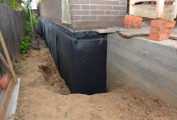 SJ Waterproofing Pros technician performing targeted Sump Pump Installation assessment in Dublin, OH